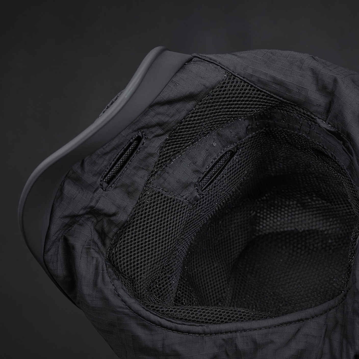 Close-up of the RIME climate hood lining with chilled-air vents at the temples and nape.